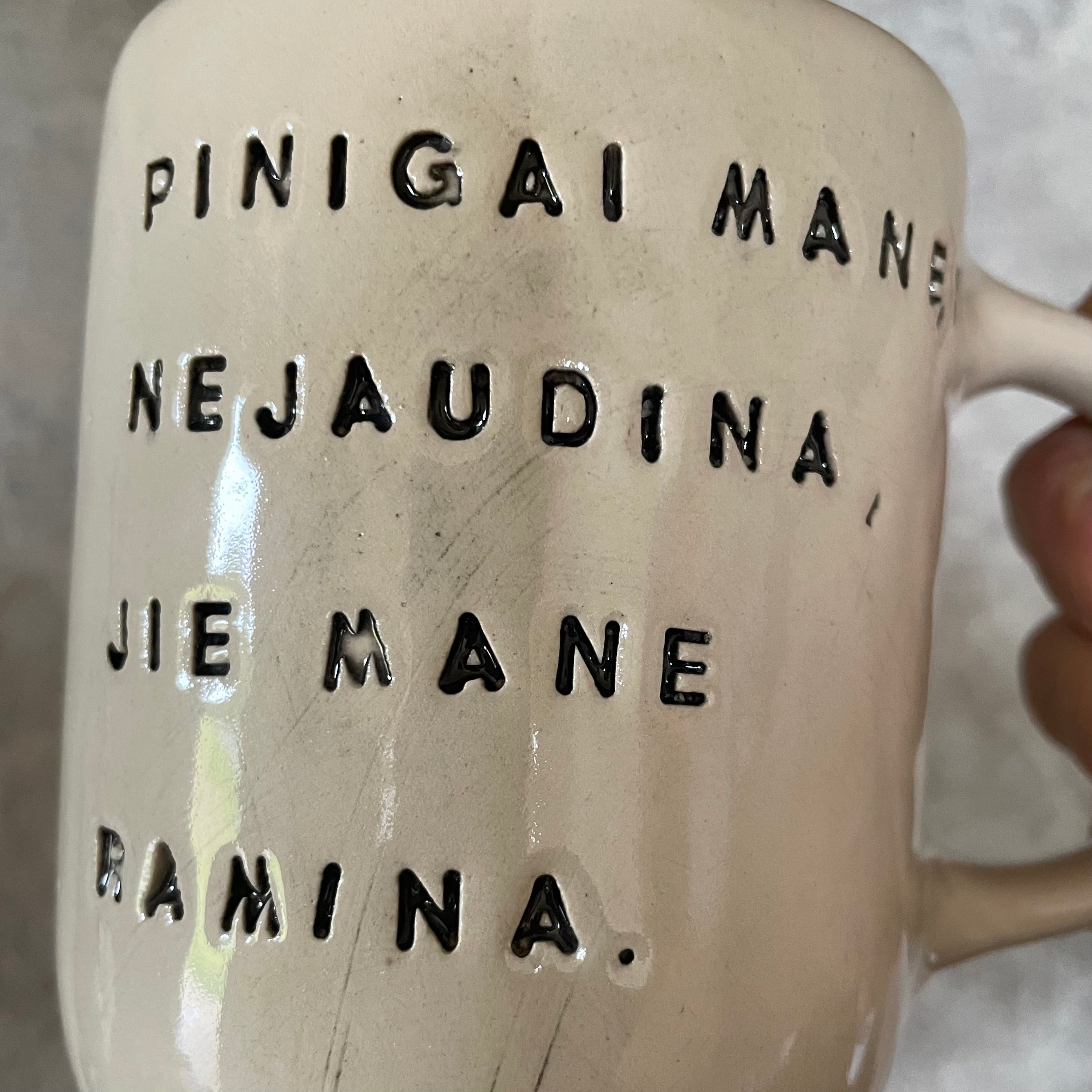 Ceramic mug with funny saying about money