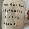 Ceramic mug with funny saying about money