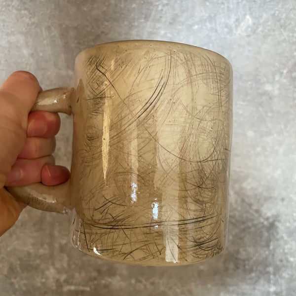 Beige large handmade ceramic mug with saying about peace