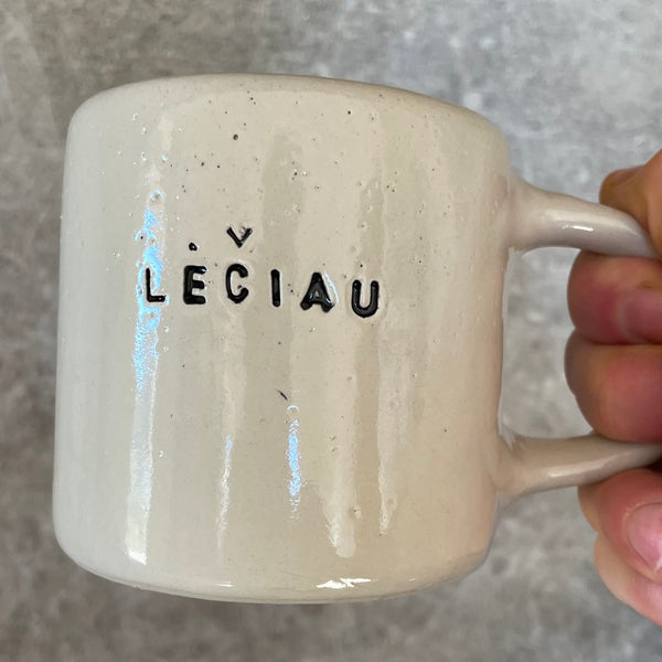 Ceramic mug with word LĖČIAU