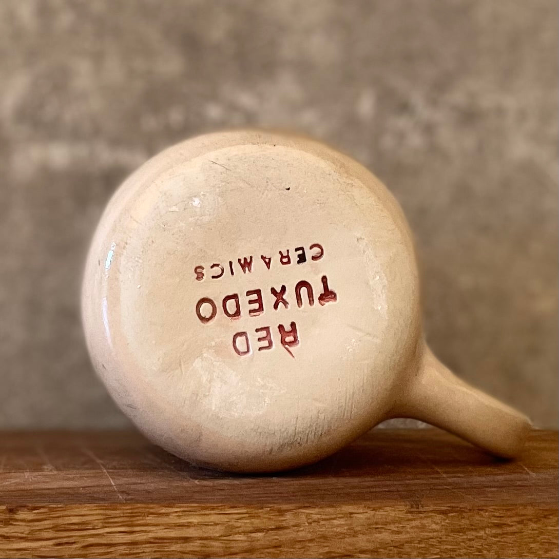 Ceramic mug with words about work