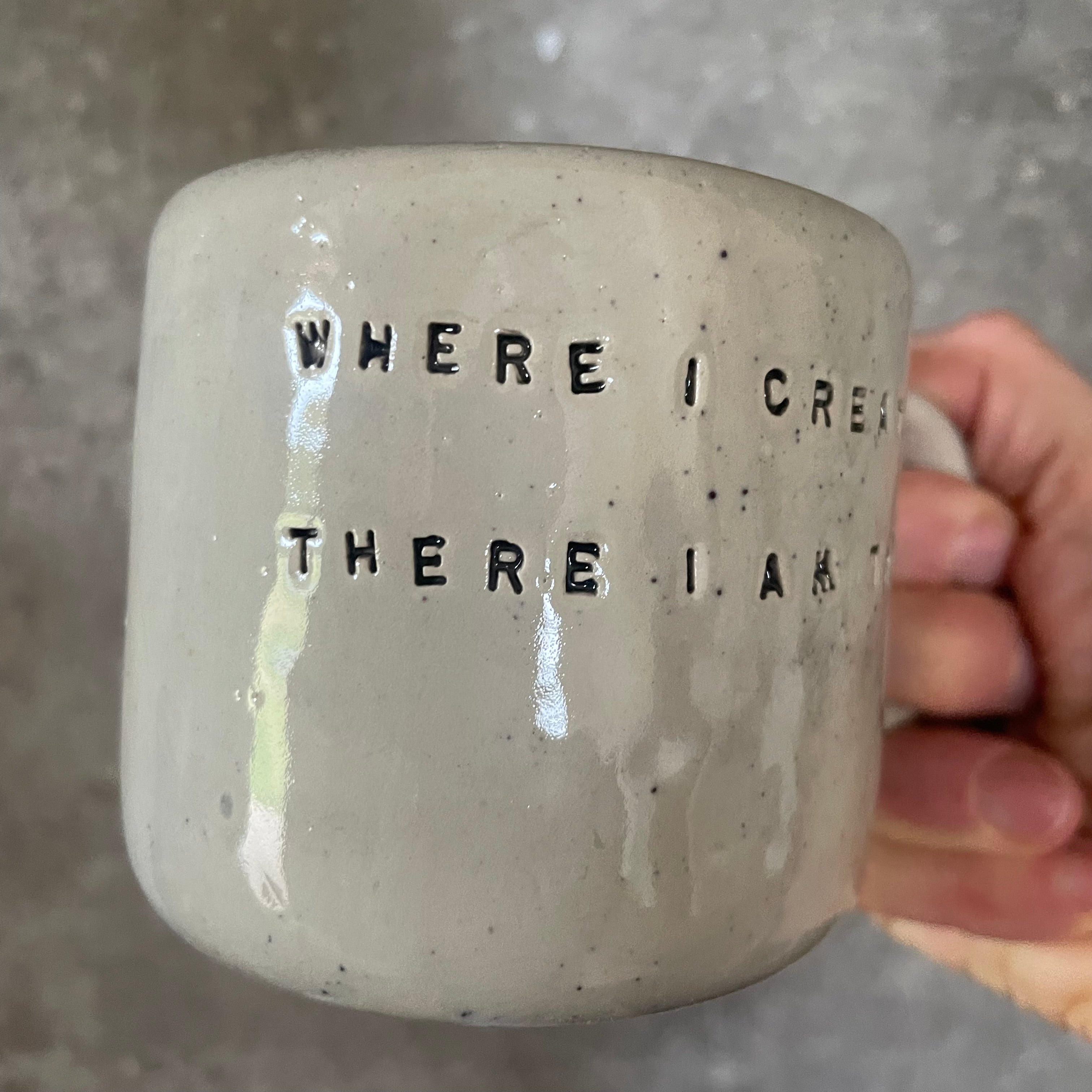 Ceramic mug with artist quote