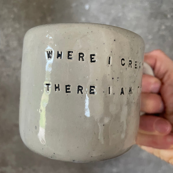 Ceramic mug with artist quote