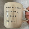 Ceramic mug with money saying