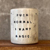 Ceramic tumbler mug with magic saying