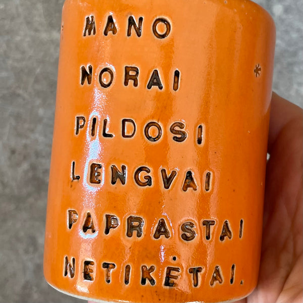 Bright orange mug about wishes