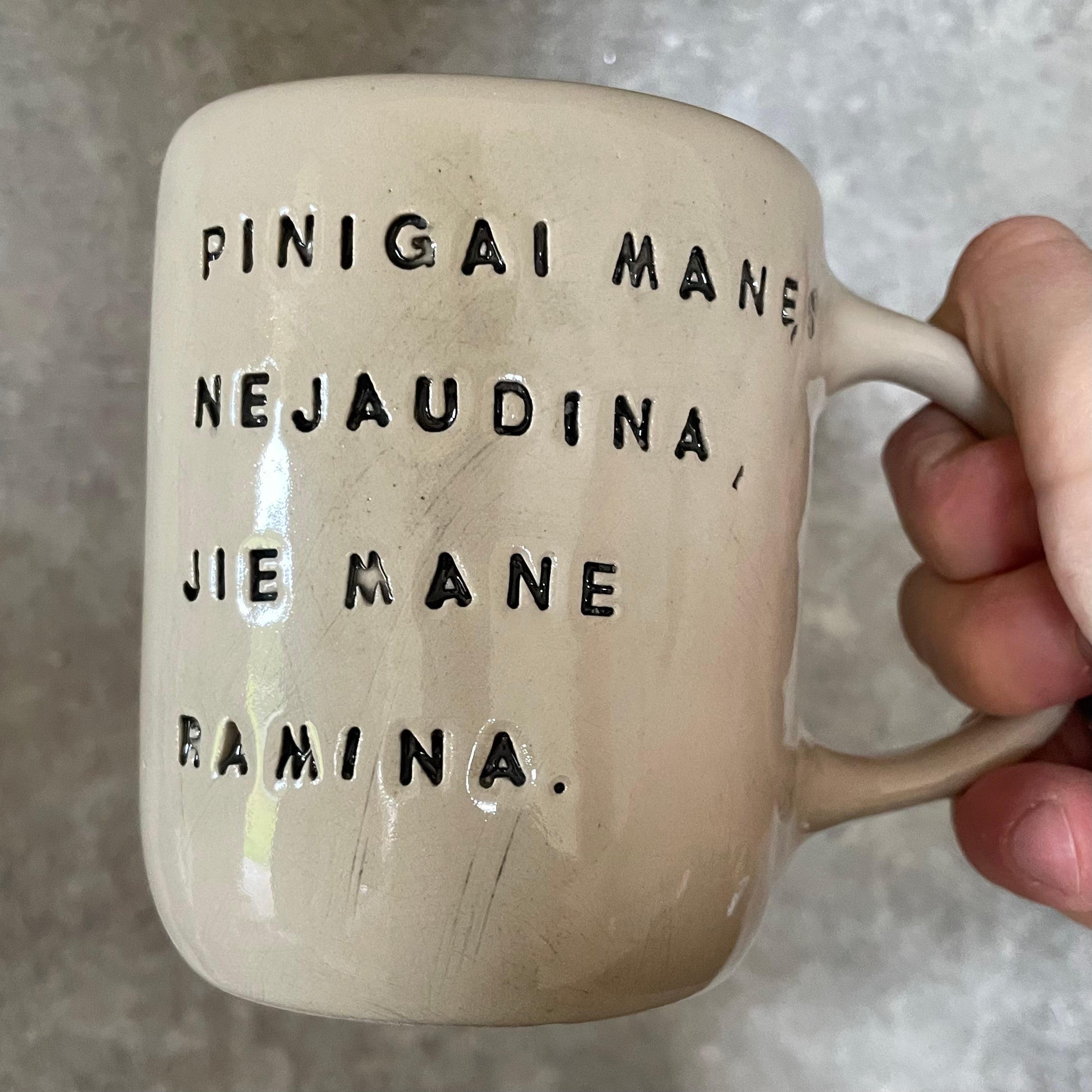 Ceramic mug with funny saying about money