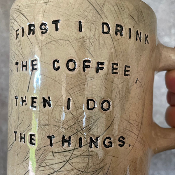 Big mug with saying about coffee