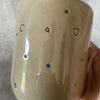 Beige mug with funny phrase in Lithuanian