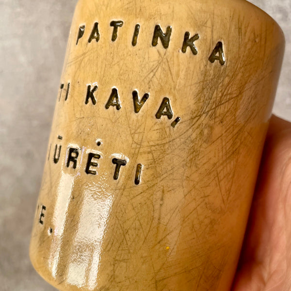 Yellow mug about coffee and you