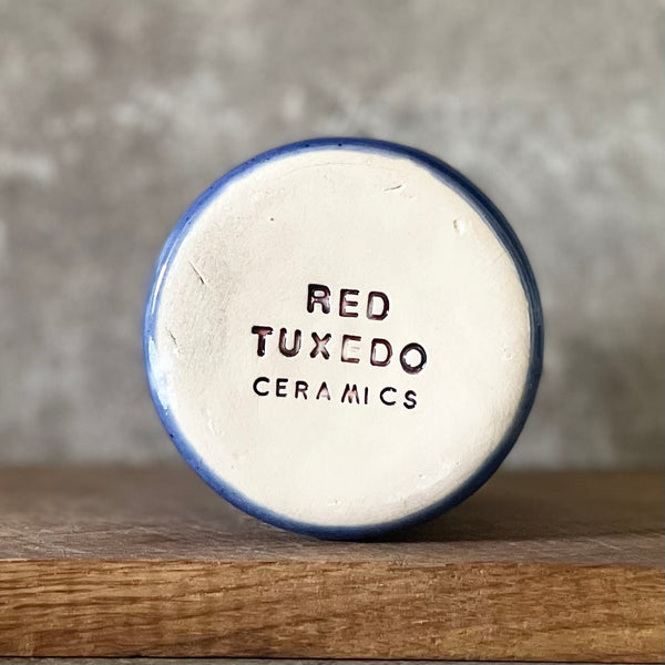 Blue coffee mug with quote by Vergil