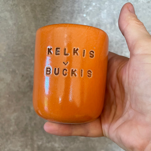 Orange mug KELKIS BUČKIS 150 ml