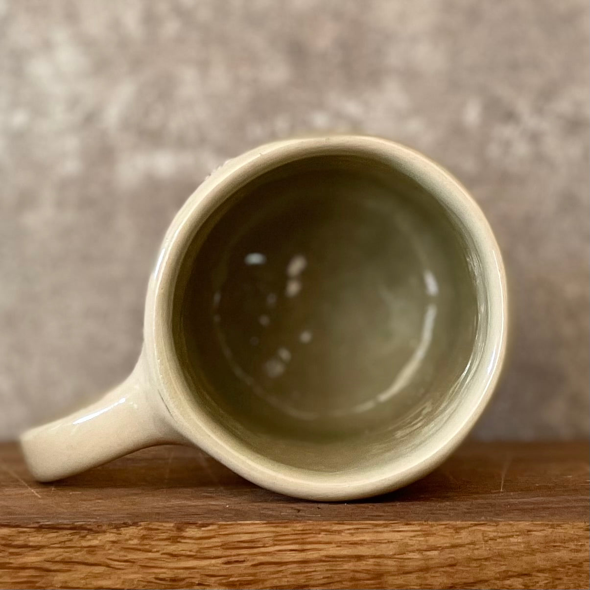 Beige mug with quote