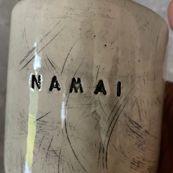Tumbler mug with word in Lithuanian NAMAI