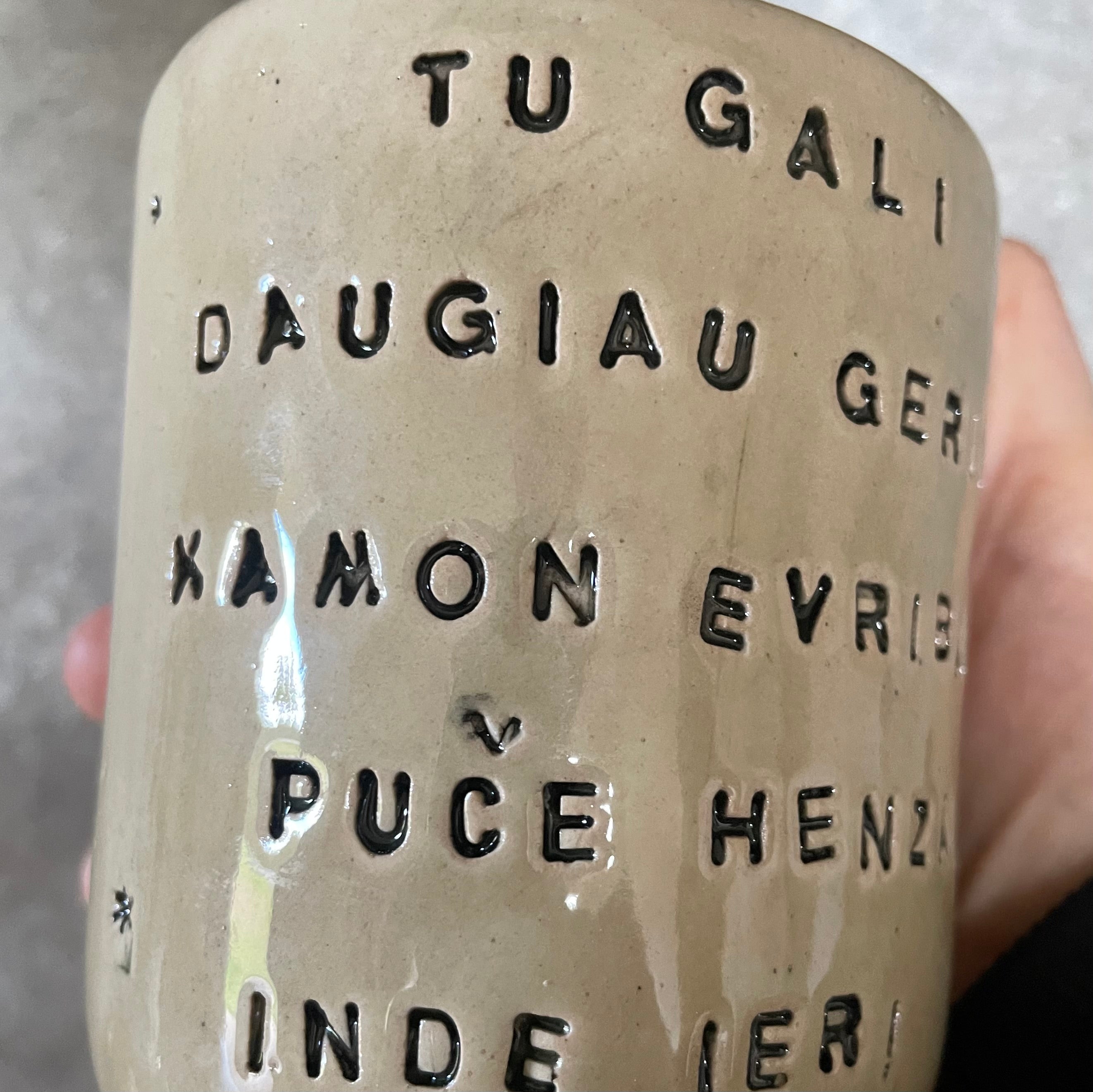 Beige mug with funny phrase in Lithuanian