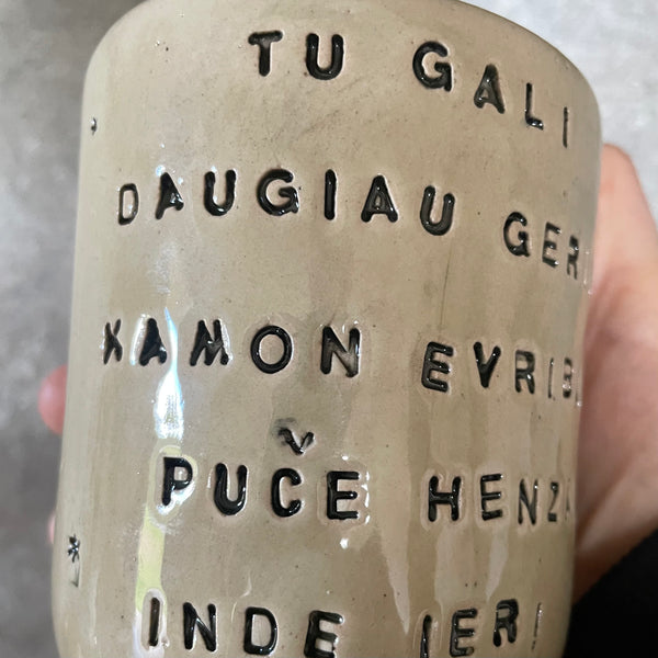 Beige mug with funny phrase in Lithuanian