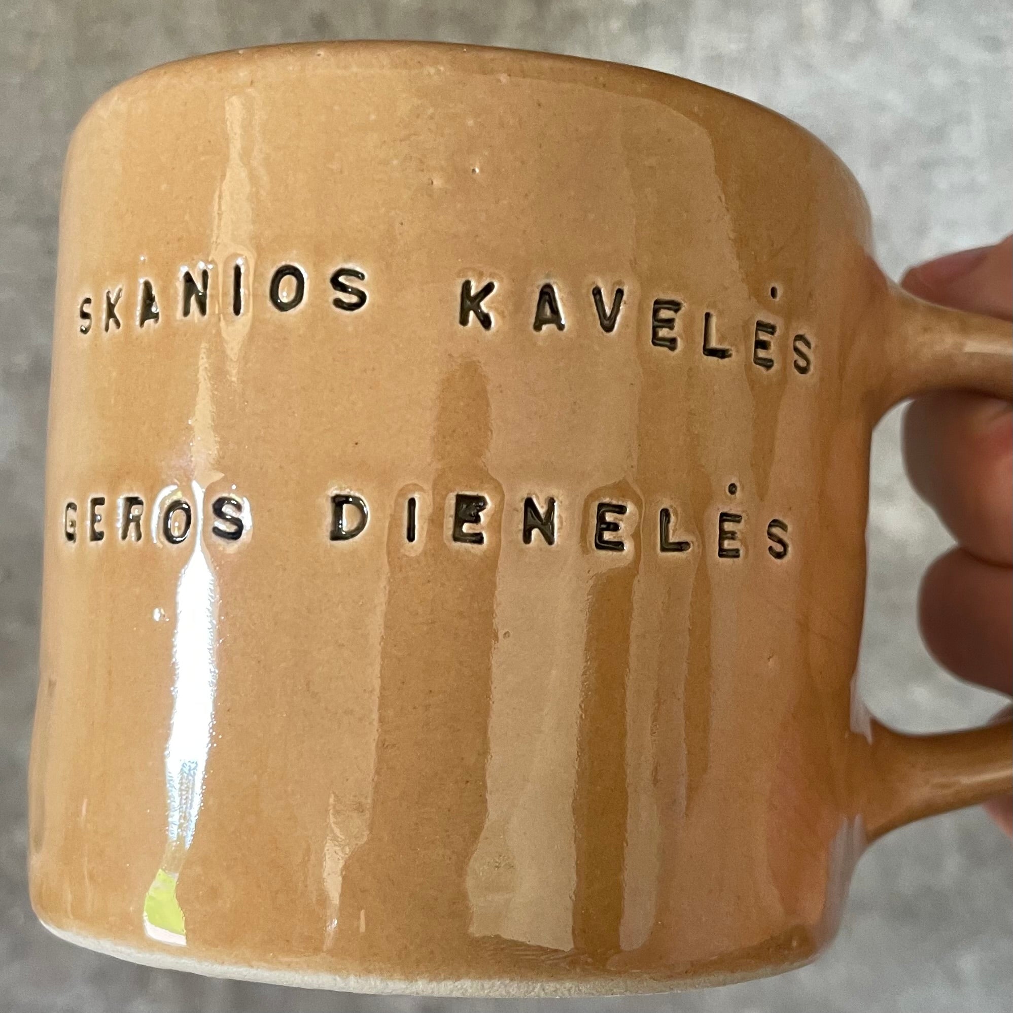 Brownish mug with good wishes