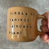 Caramel mug with words about work