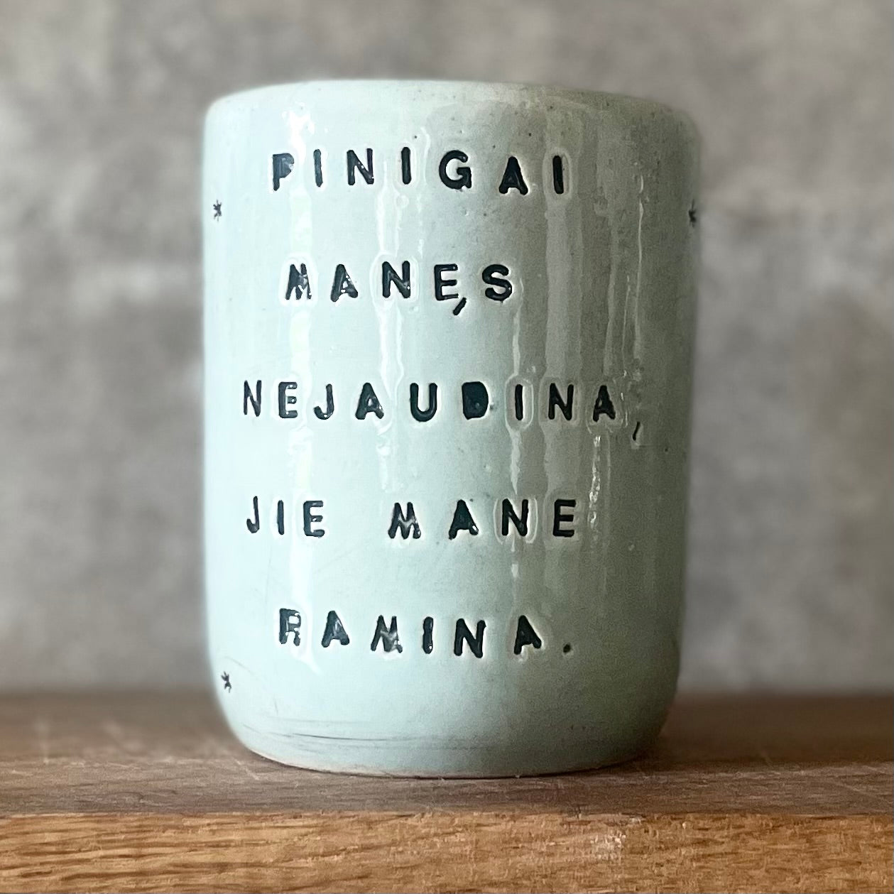 Ceramic mug about money