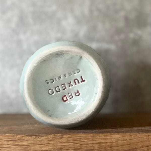 Ceramic mug about money