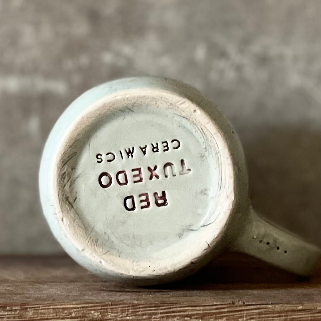 Blue mug with funny saying in mixed Lithuanian