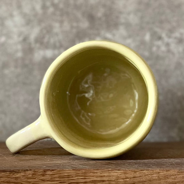Yellow ceramic mug with saying in Russian