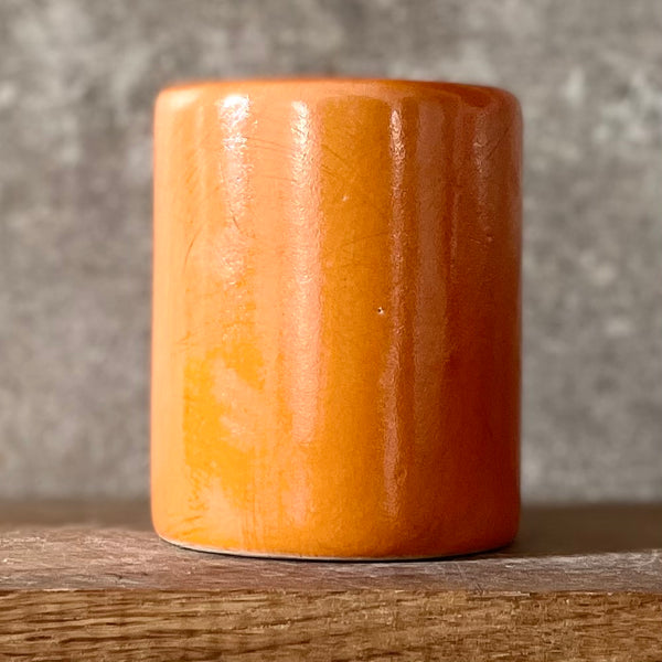 Bright orange mug with blessing