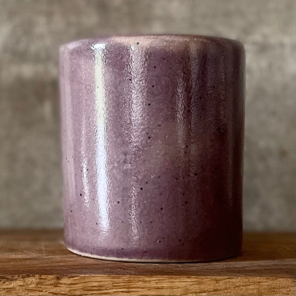 Purple mug with saying in Lithuanian