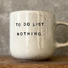 Speckled mug with cozy saying