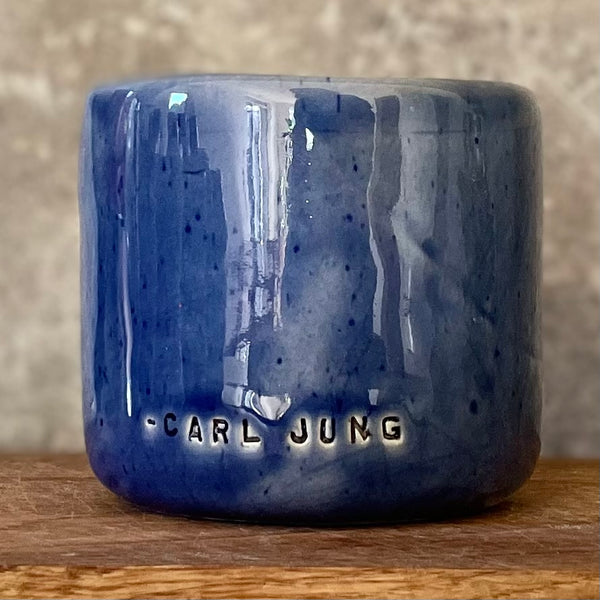 Blue tumbler mug with quote by C. Jung