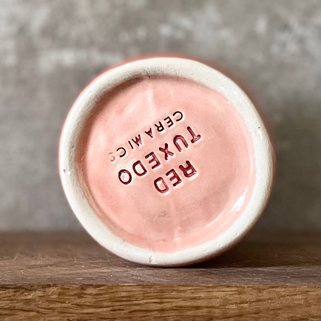 Red coffee mug without handle