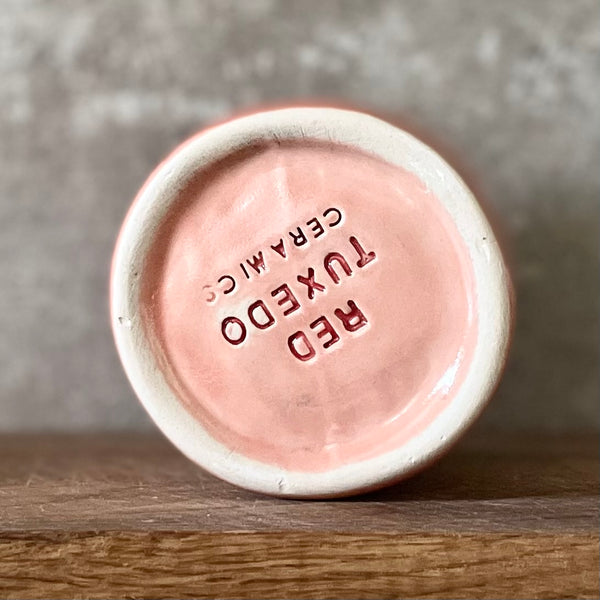 Red coffee mug without handle