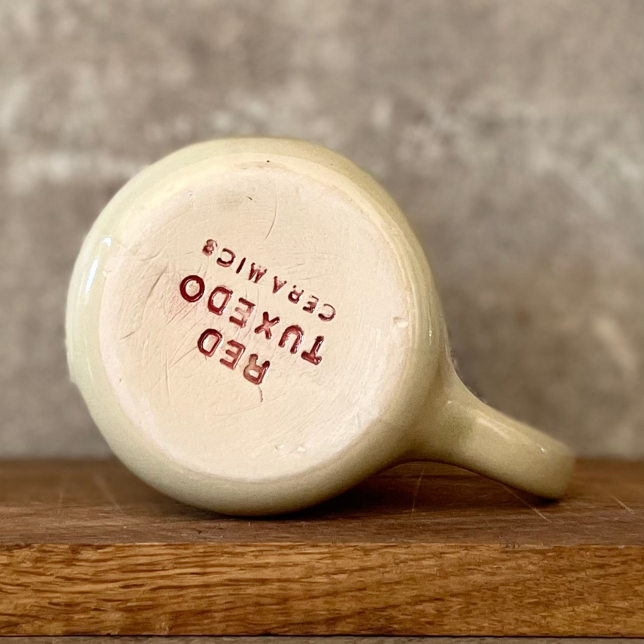 Beige mug with quote