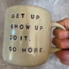 Beige mug with quote