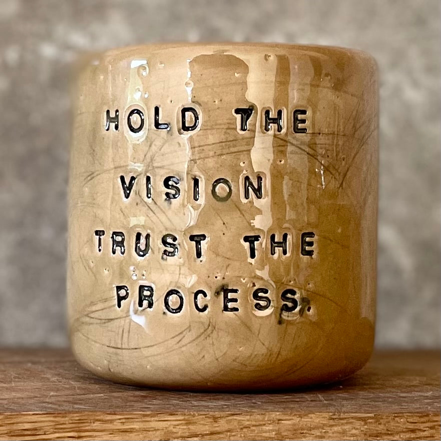 Bright yellow tumbler mug with inspirational words