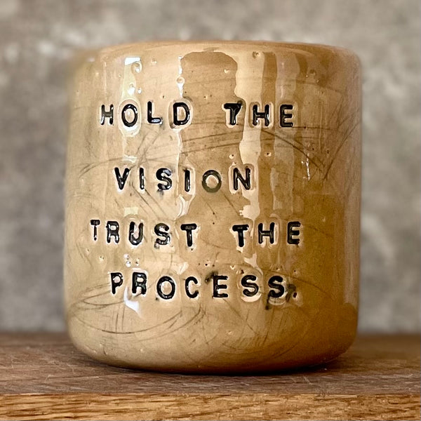 Bright yellow tumbler mug with inspirational words