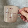 Small pink mug with words in Lithuanian