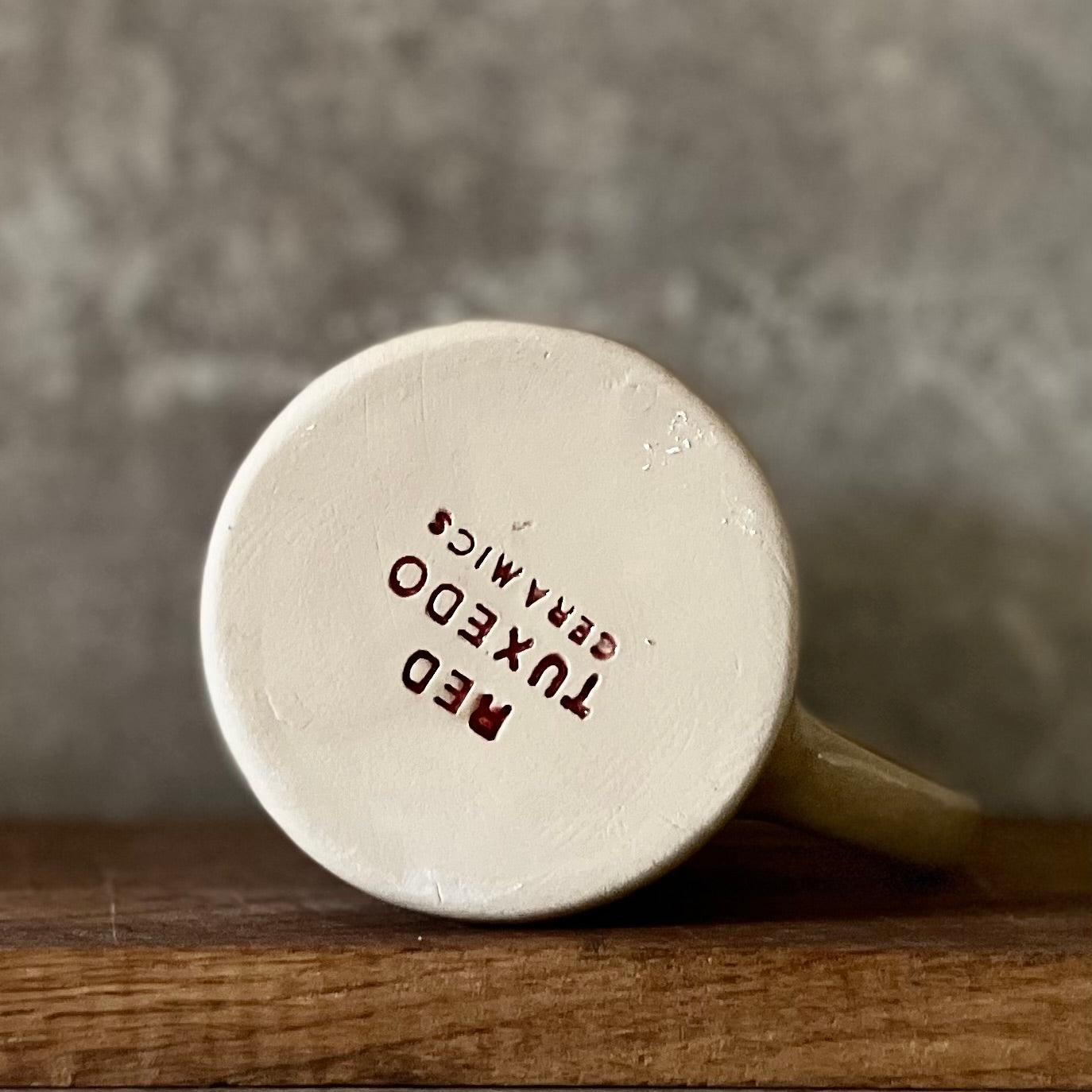 Beige mug with love saying in Lithuanian