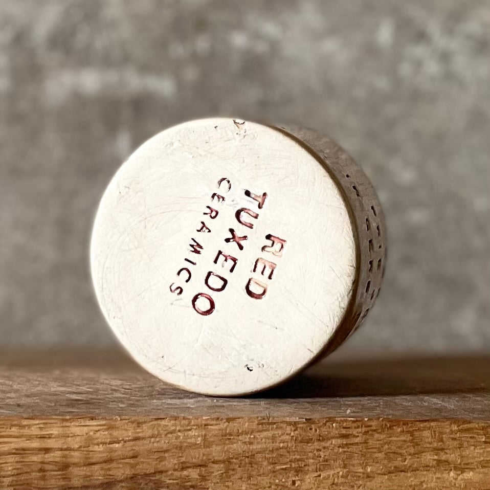 Mažas puodelis su mielu užrašu apie kavą