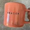 Raudonas puodelis "Pradėk"