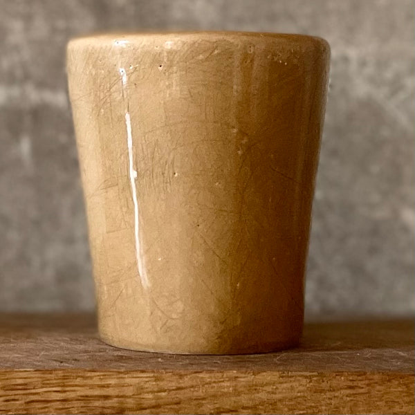 Caramel brown mug with phrase