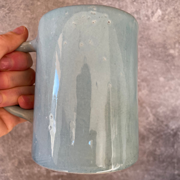 Blue mug with quote about goals