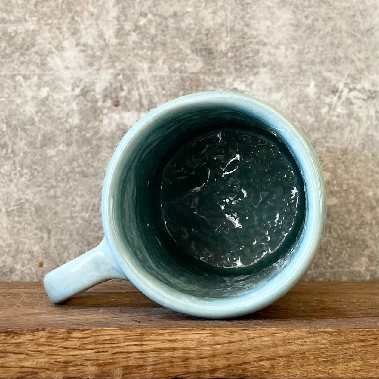 Blue mug with quote about goals