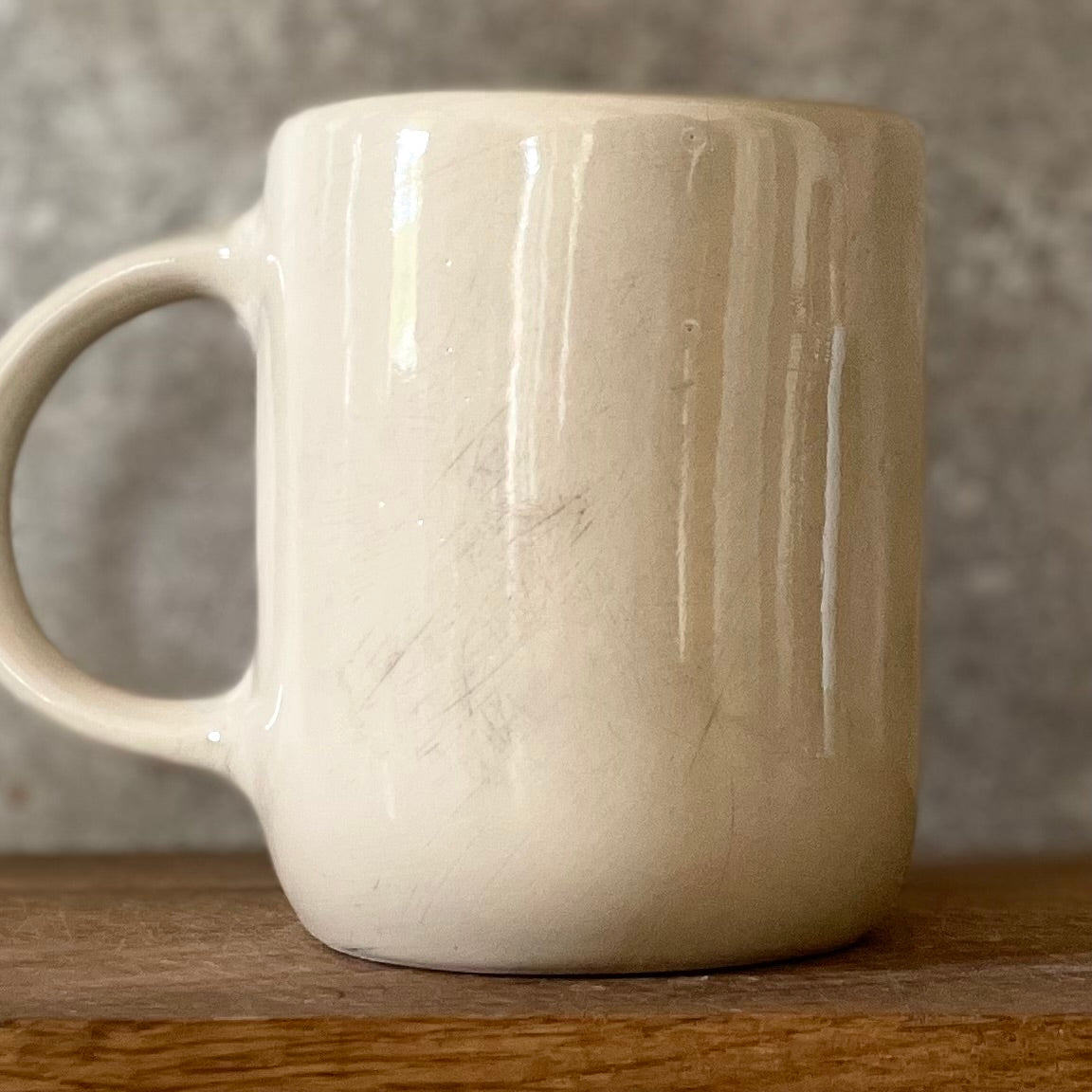 Ceramic mug with funny saying about money