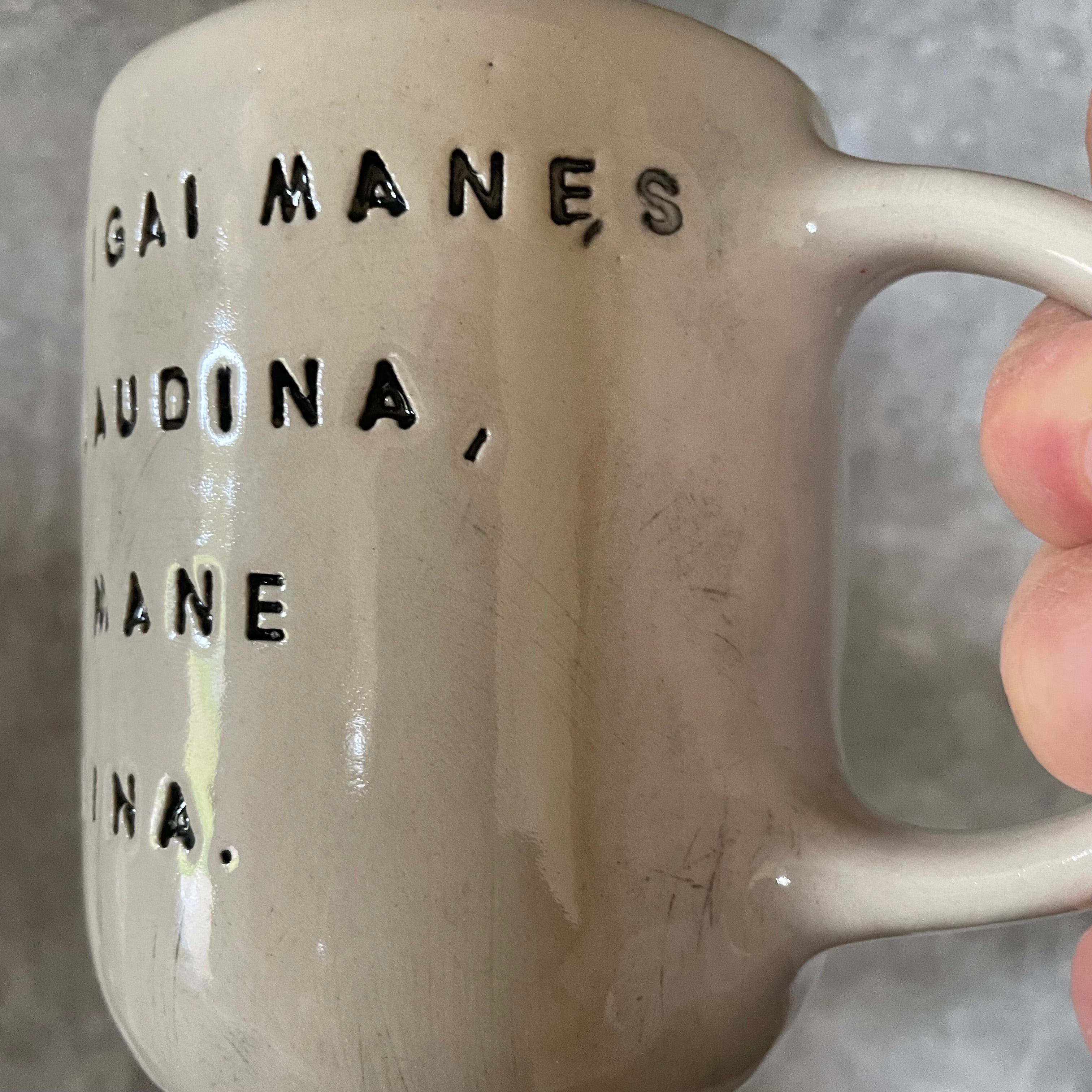 Ceramic mug with funny saying about money