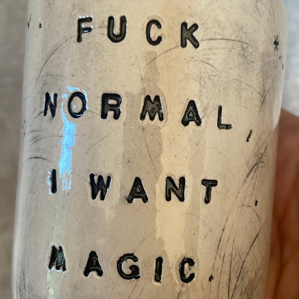 Ceramic tumbler mug with magic saying