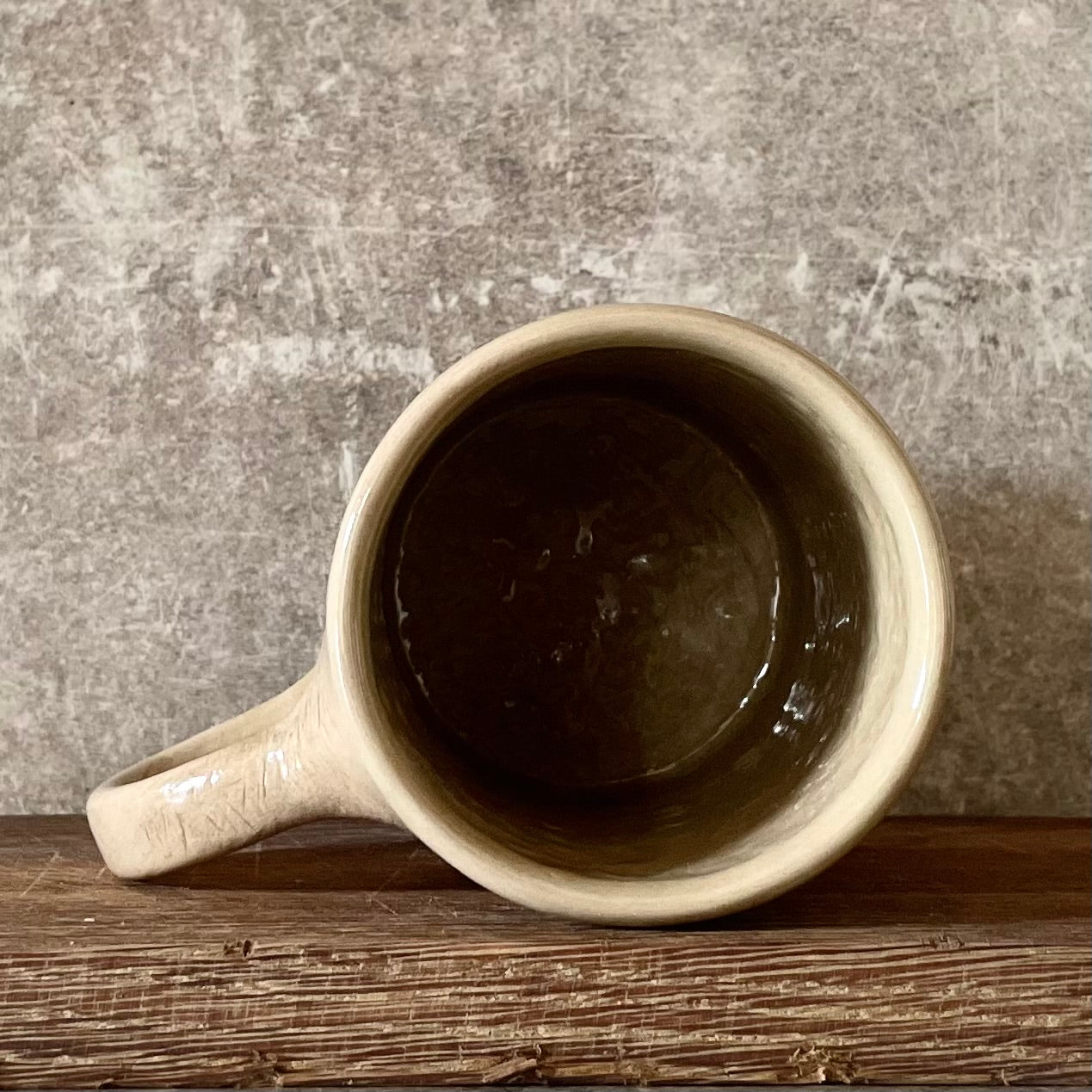 Brownish mug with funny saying