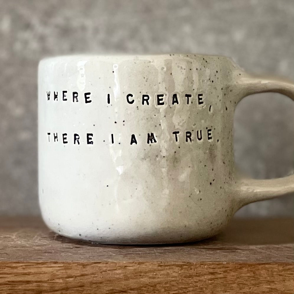 Ceramic mug with artist quote