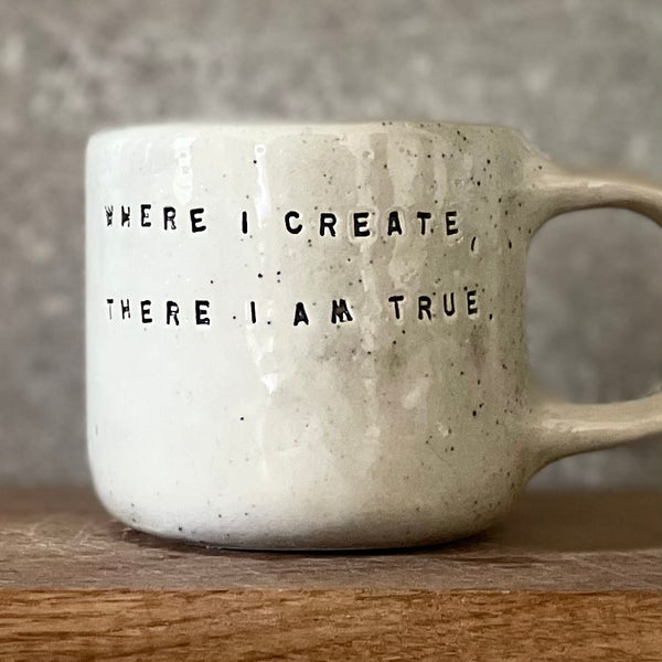 Ceramic mug with artist quote