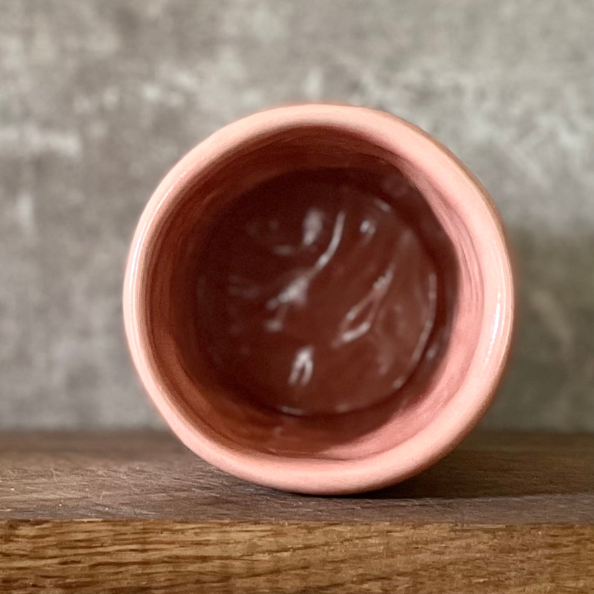 Red coffee mug without handle